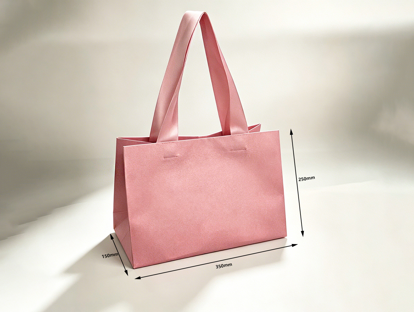 High-quality Custom-designed Luxurious Embossed Craftsmanship Solid-colored Bow-shaped Gift Bag With Silk Handle